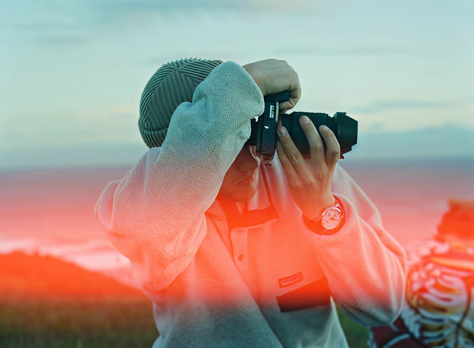 Photographer at surf break